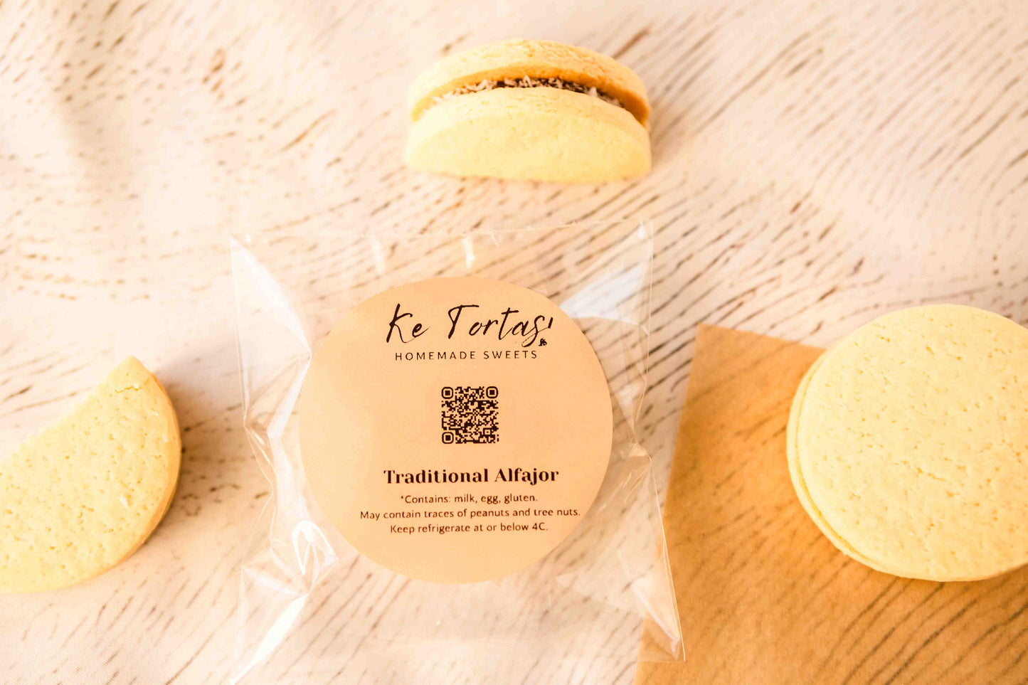 individually wrapped traditional alfajor rolled in coconut.