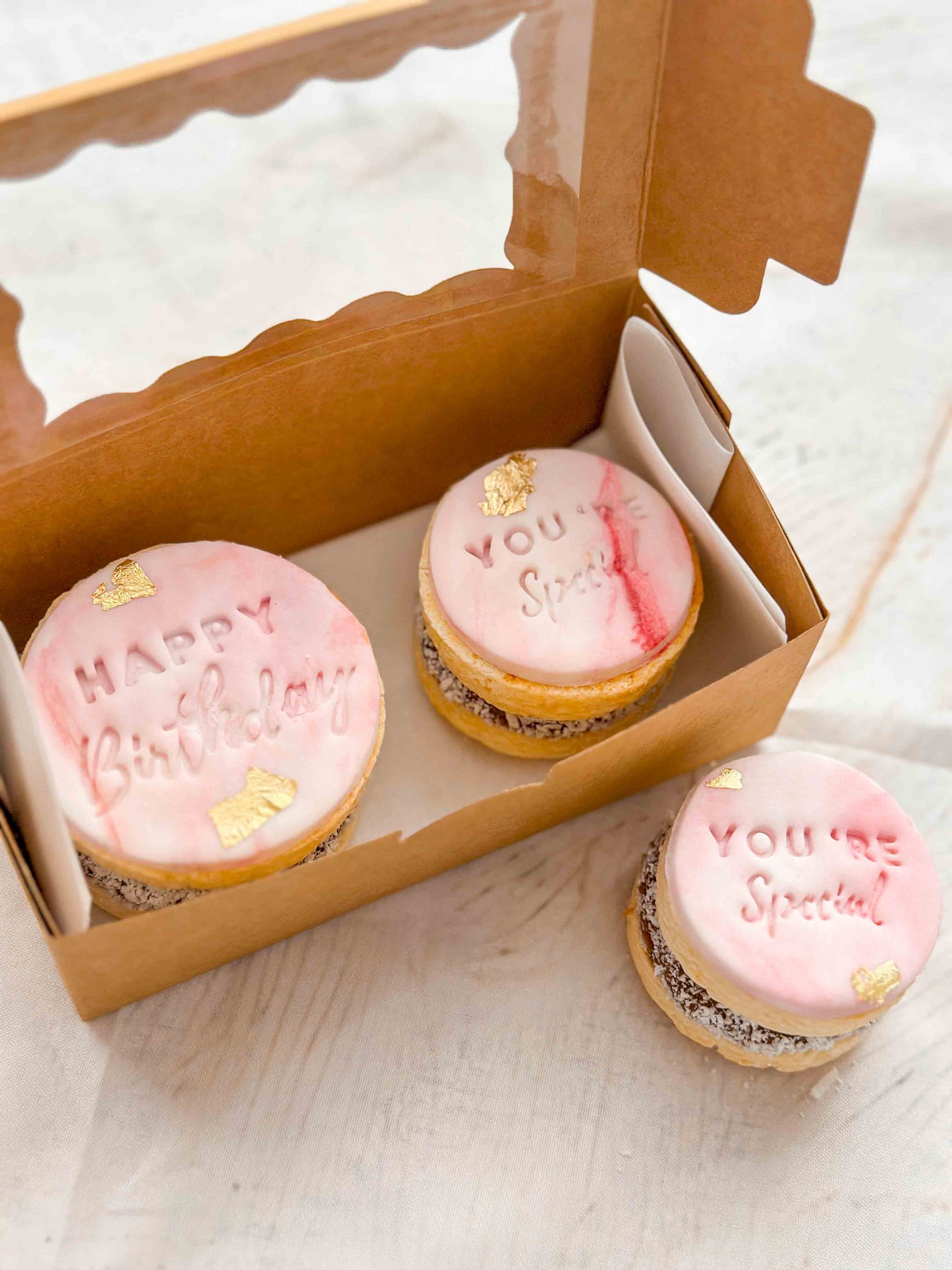 Custom alfajores with “Happy Birthday” and “You Are Special” messages, presented in a small gift box, handmade in Perth.